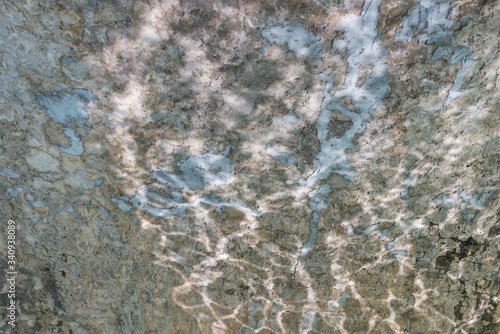 Stone background and water