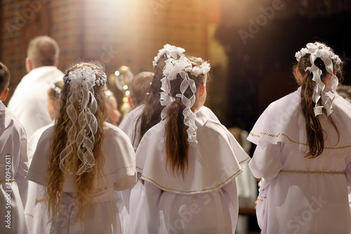 Children going to the first holy communion in the Catholic church