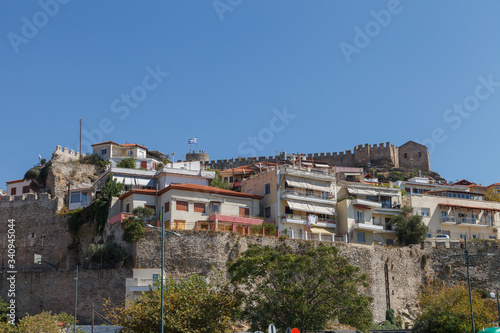 Aerial panoramic view of Greek resort Kavala, big port with old fortress and old town © yegorov_nick