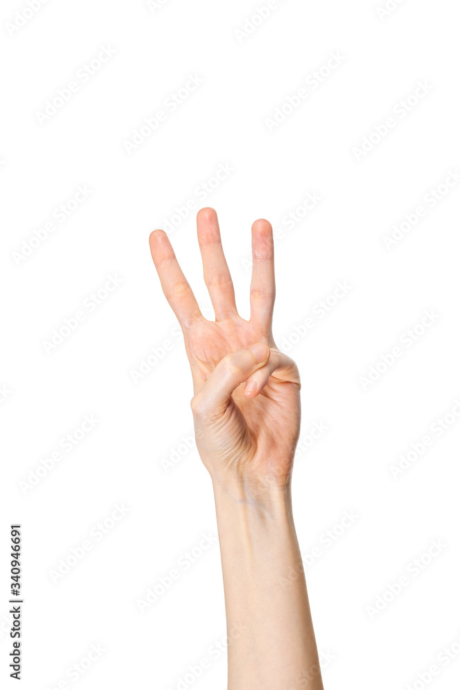 Woman hand showing three fingers on white background Woman hand showing three fingers on white background