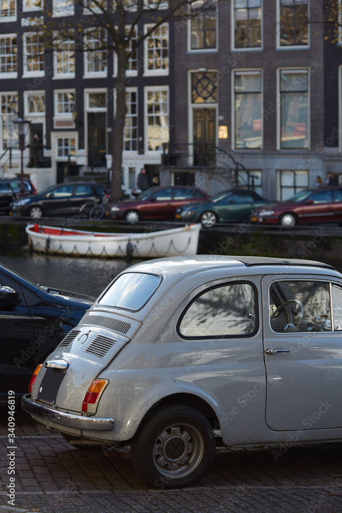 A car parked near an Amsterdam canal