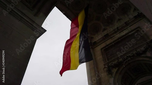 Belgium Flag under Arc De Triomphe In Parc Du Cinquantenaire, Brussels