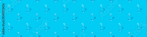 Hand sanitizer gel pattern on blue background.