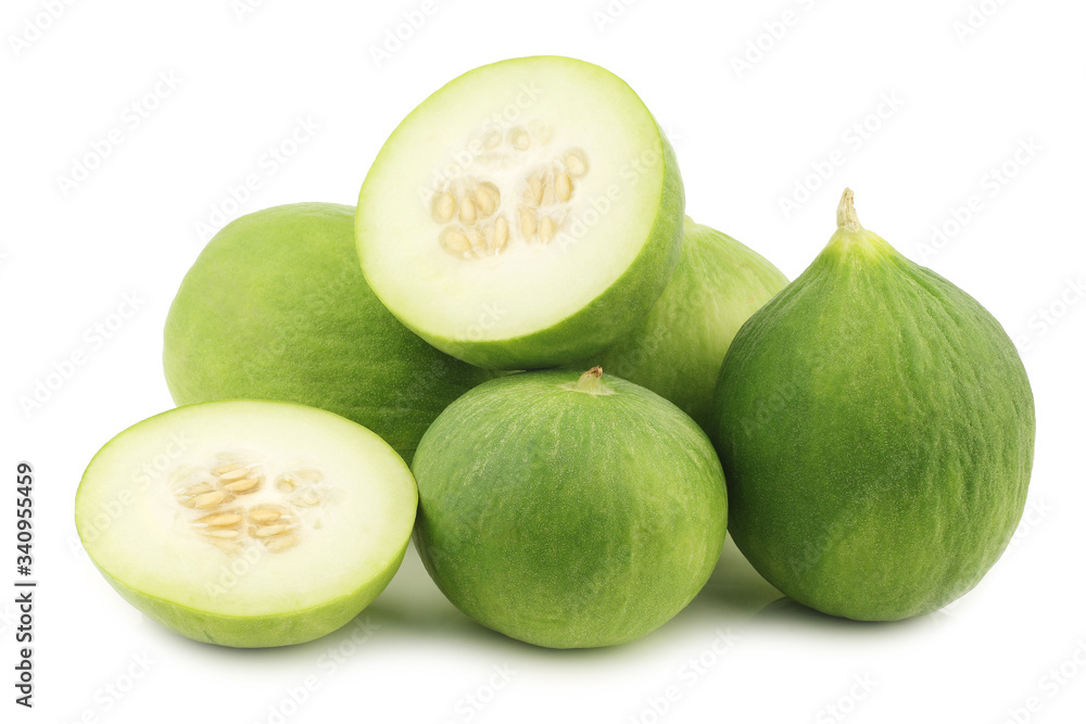 bunch of fresh cumelo's (mix between a cucumber and a melon) and a cut one on a white background bunch of fresh cumelo's (mix between a cucumber and a melon) and a cut one on a white background