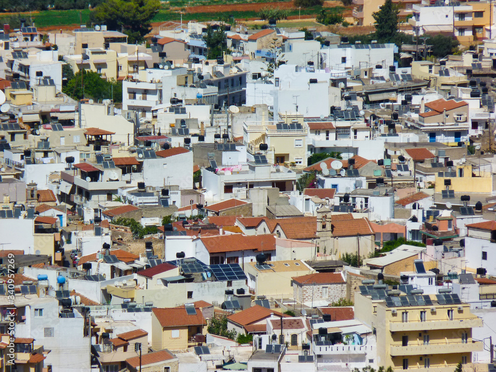The roofs of tightly packed houses on the island of Crete, Greece.