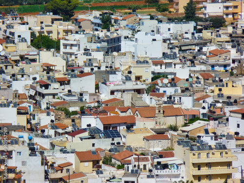 The roofs of tightly packed houses on the island of Crete, Greece. © Alan