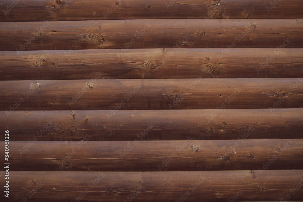 Obraz premium Picture of an old log cabin wall texture. Wood log background.