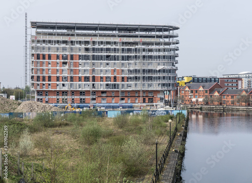 Construction of new residential apartment buildings adjacent to the waterfront in an urban city centre location.