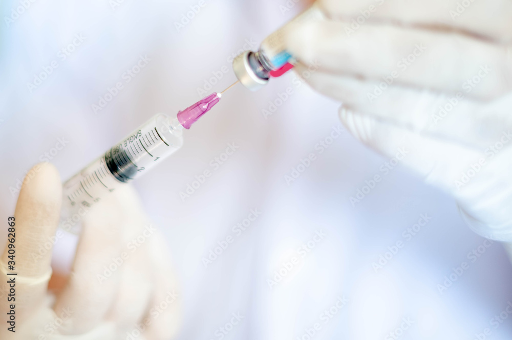 Syringe medical injection in hand holding with medicine dose vaccination equipment with needle. Syringe medical injection in hand holding with medicine dose vaccination equipment with needle.