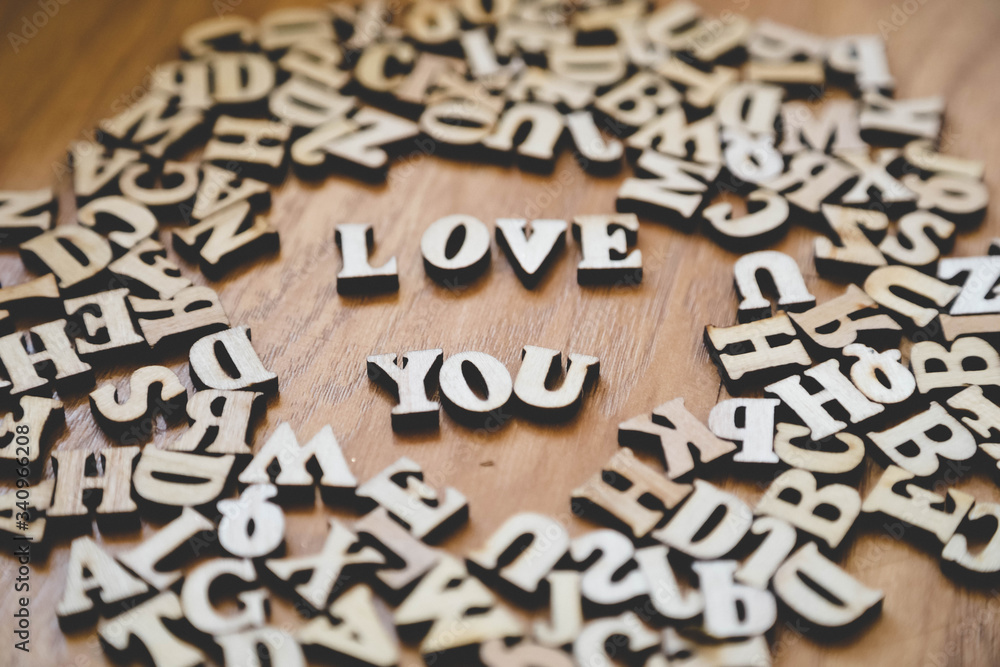 written in wooden letters love you written in wooden letters love you