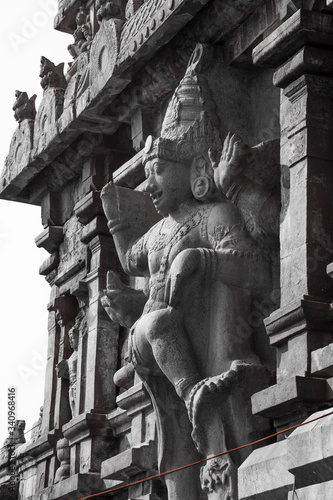 A giant statue at the entrance of Bragadeeswarar temple in  tanjore tamil nadu photo