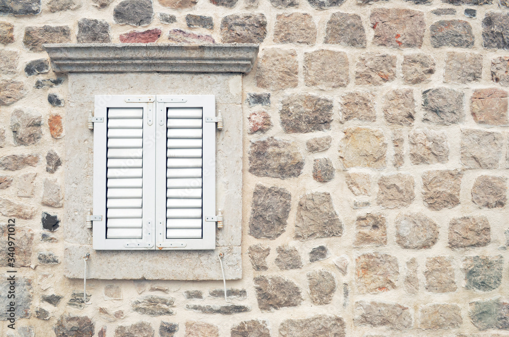 Old window on old stone house Old window on old stone house