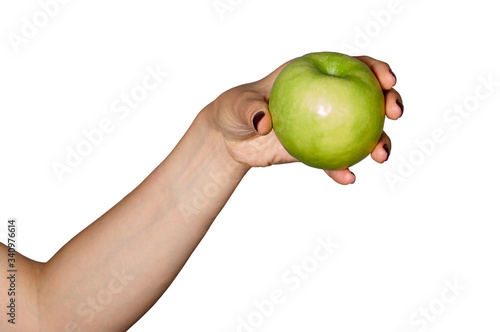 Green apple in womans hand. Isolated on white