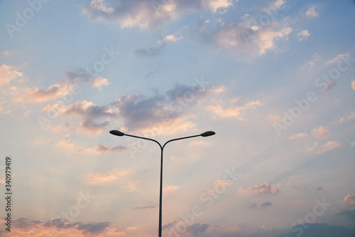 Cloudscape and Street Light Pole During the Sunset.