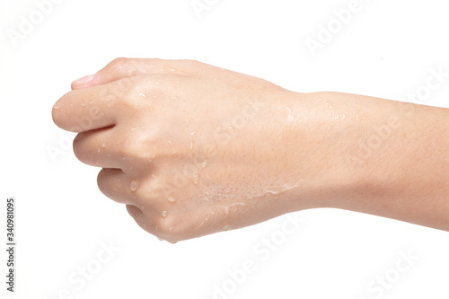 Konstfotografi moist wet fist holding hand.
