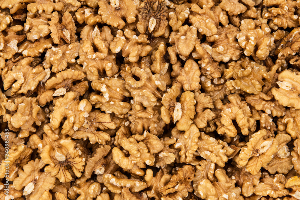 Background made of nuts, walnuts as a background Background made of nuts, walnuts as a background