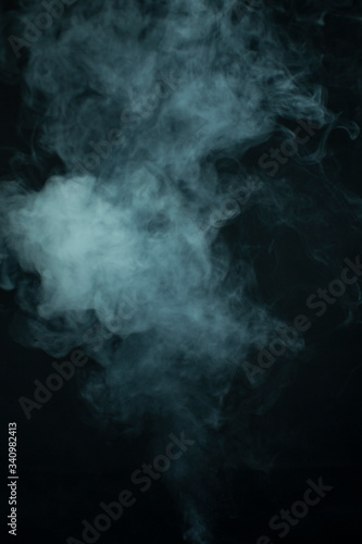 Smoke. Cloud of vapor. Dark blue background © Oleksandr