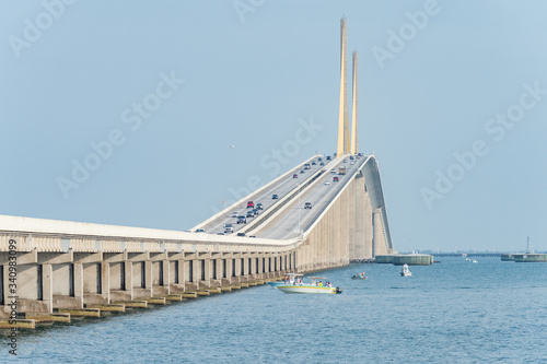 Approach to Skyway Bridge with boaters fishing on one side