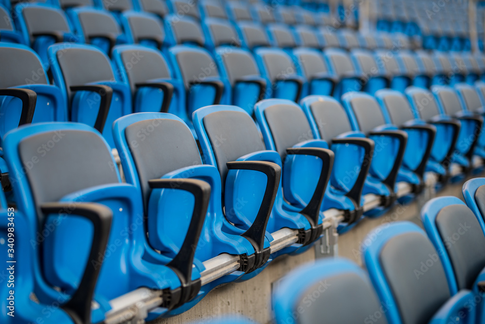 Fototapeta premium Empty blue seats in stadium
