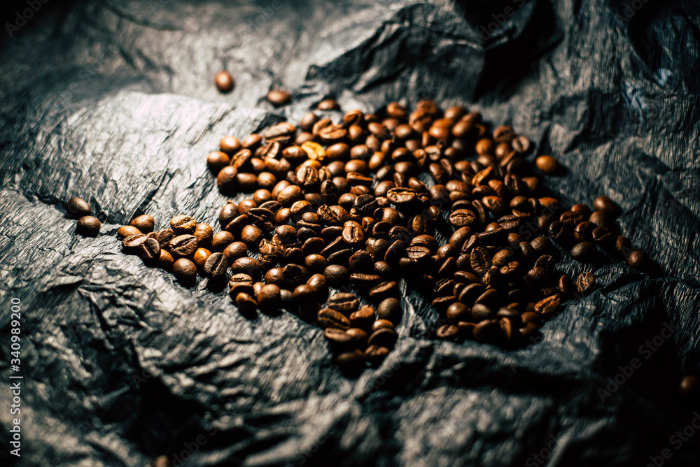 Coffee beans on black background Coffee beans on black background