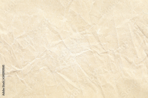 light yellow crumpled paper background texture 