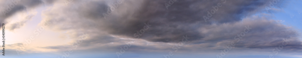 Summer evening sky panorama with clouds background. Summer evening sky panorama with clouds background.