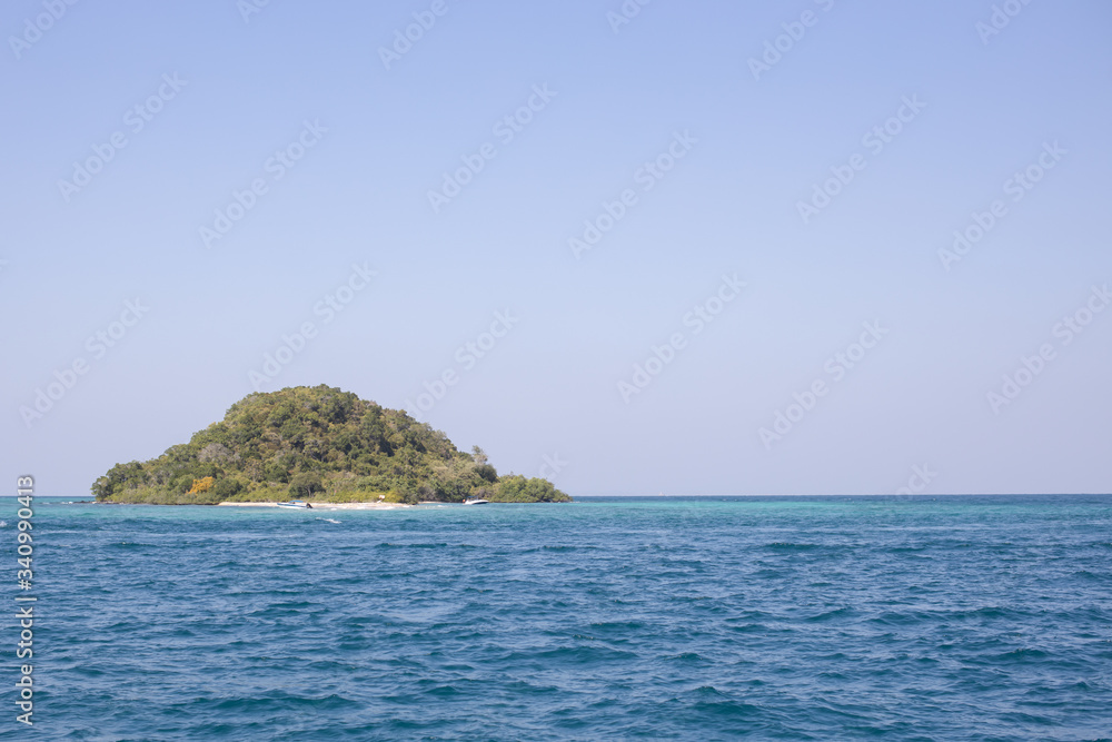 scenery view of tropical island with blue sky and sea