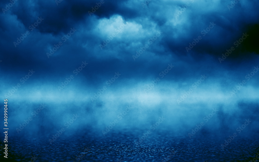 Blue abstract background of the night sky, reflection of the lights of the night city on the pavement. Smoke, fog, smog. Blue abstract background of the night sky, reflection of the lights of the night city on the pavement. Smoke, fog, smog.