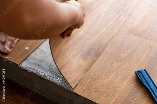 sheet vinyl type installation work on site by contractor team