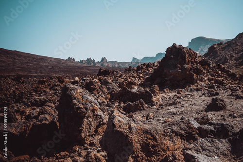 Volcanic rocks in the hills of Tenerife with clear blue skies © Ilia Grechko