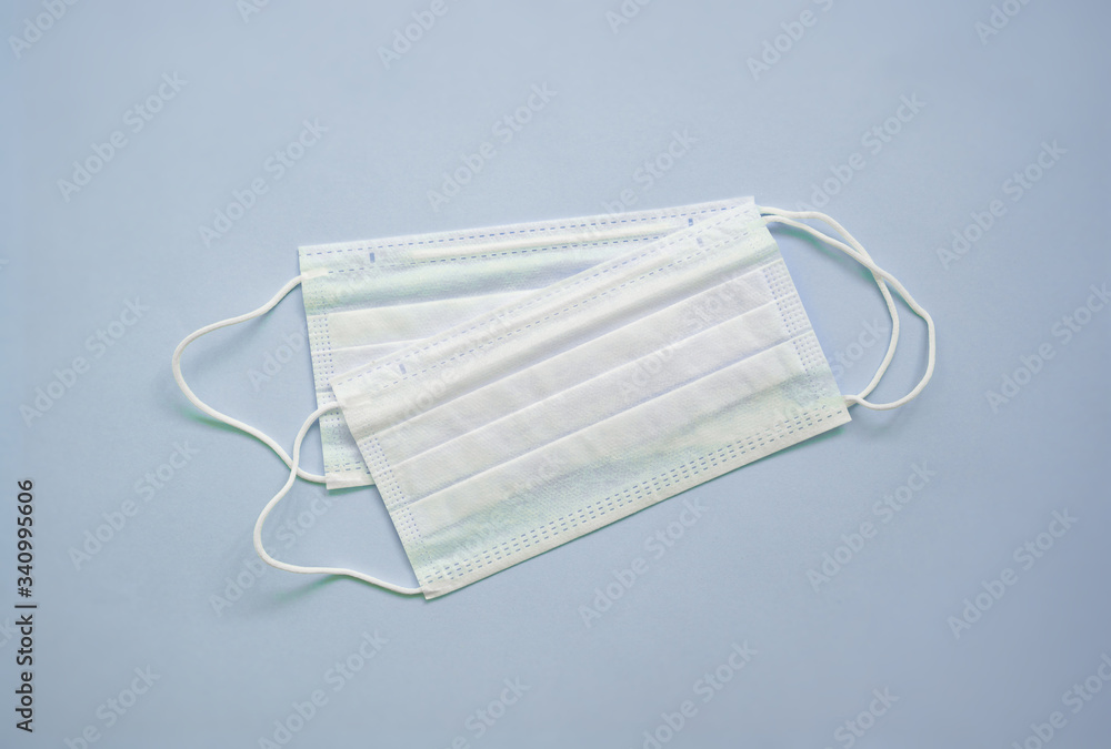 Typical 3-ply surgical masks cover mouth nose Typical 3-ply surgical masks cover mouth nose