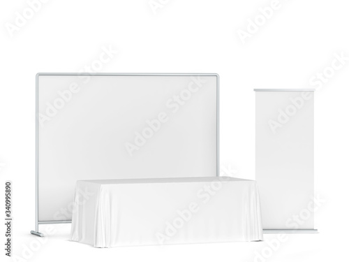 Blank tradeshow tablecloth with roll-up banners aside