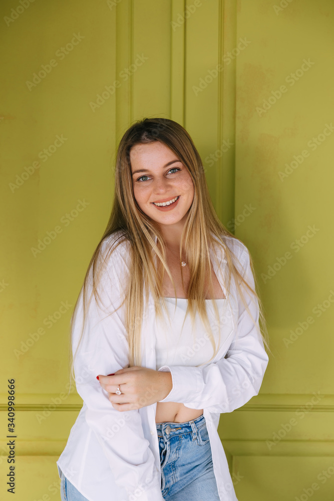 Candid woman with perfect teeth and smile looking at camera Candid woman with perfect teeth and smile looking at camera