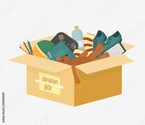 Cartoon donation box with lettering inscription full of things for aid people vector illustration. Colorful charity cardboard for donating help homeless and support needy isolated on white