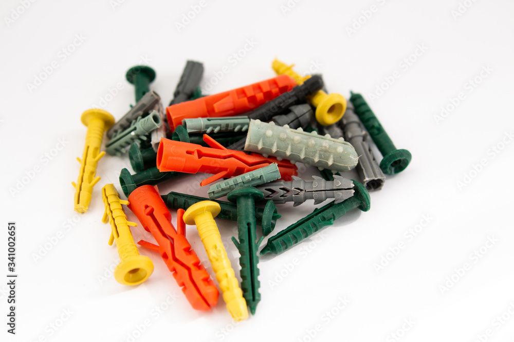 multi-colored dowels on a white background multi-colored dowels on a white background