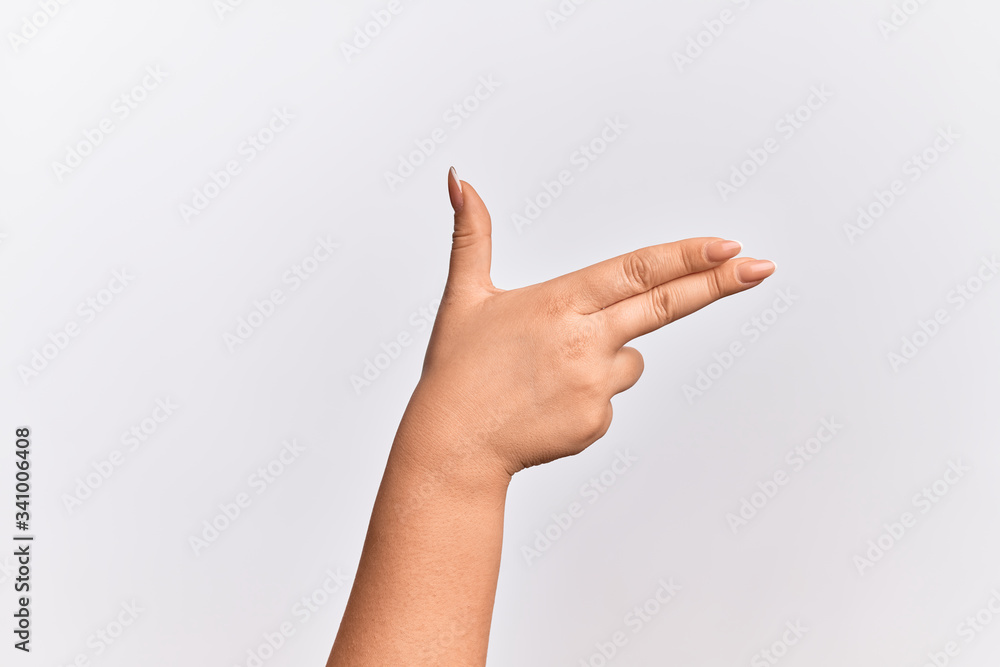 Hand of caucasian young woman gesturing fire gun weapon with fingers, aiming shoot symbol Hand of caucasian young woman gesturing fire gun weapon with fingers, aiming shoot symbol