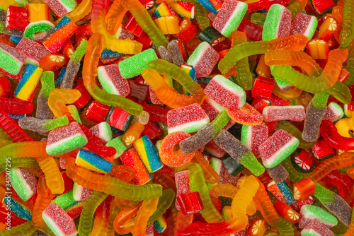 Assorted gummy candies. Top view. Jelly sweets background.