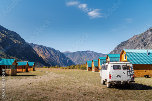 Chulyshman River, Akkurum tract, Altai Republic, Russia - September, 20, 2019: UAZ off-road minibus on the territory of Meshke Tash tourist camping photo