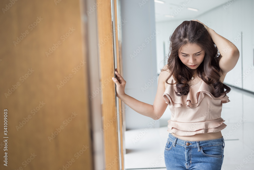 Beautiful Asia business woman over blured office  background.