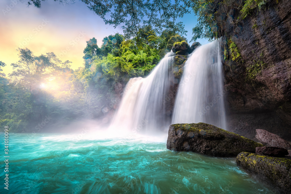 Fototapeta premium Waterfall in tropical forest at Khao Yai National Park, Thailand. View of the waterfall from below.