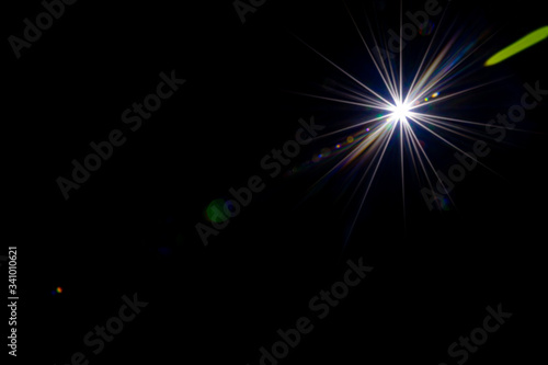 Wallpaper Mural Flare color glow. Sun flash ray lens effect on black. Star spot light or sunlight glow. Abstract bokeh lights and optical leaking reflection. Torontodigital.ca