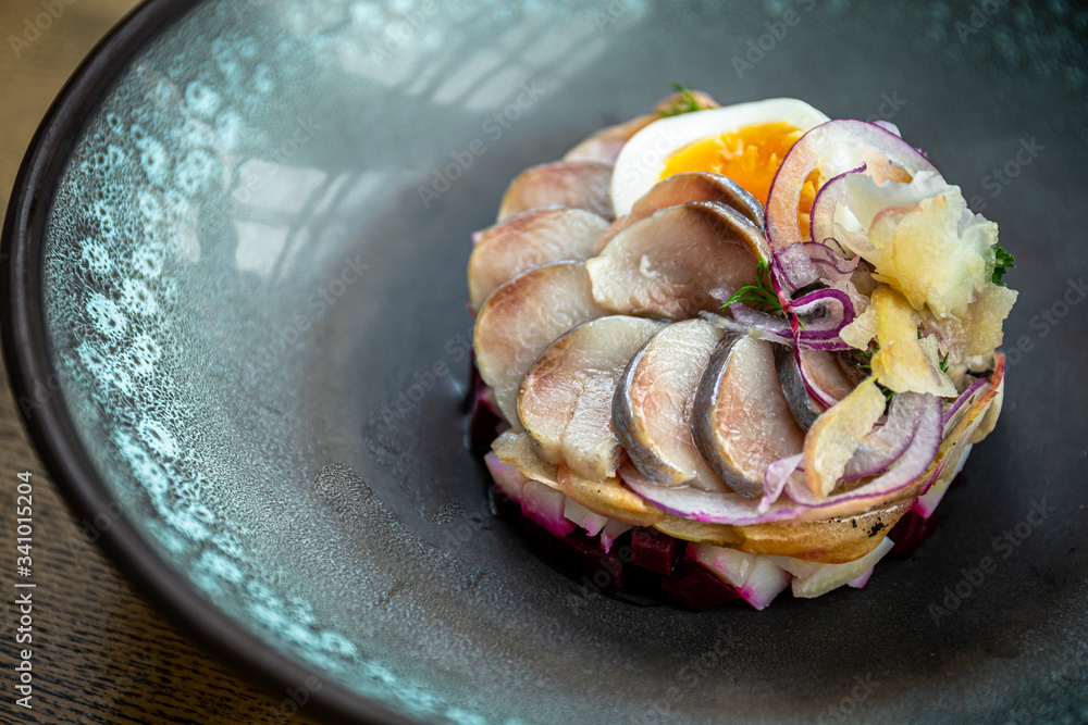 Herring tartar salad with beetroot, onions, potato Herring tartar salad with beetroot, onions, potato