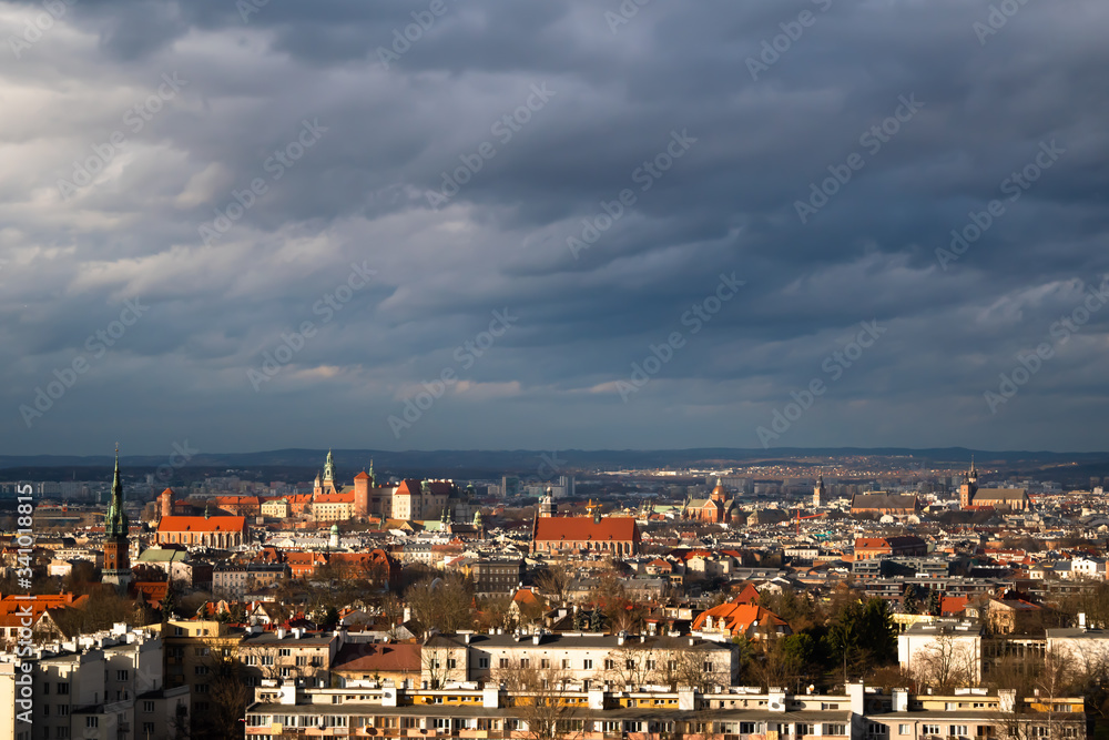 Panoramic view of Old City in Cracow a winter cloudy day with sunlight from the hill of Krakus Mound