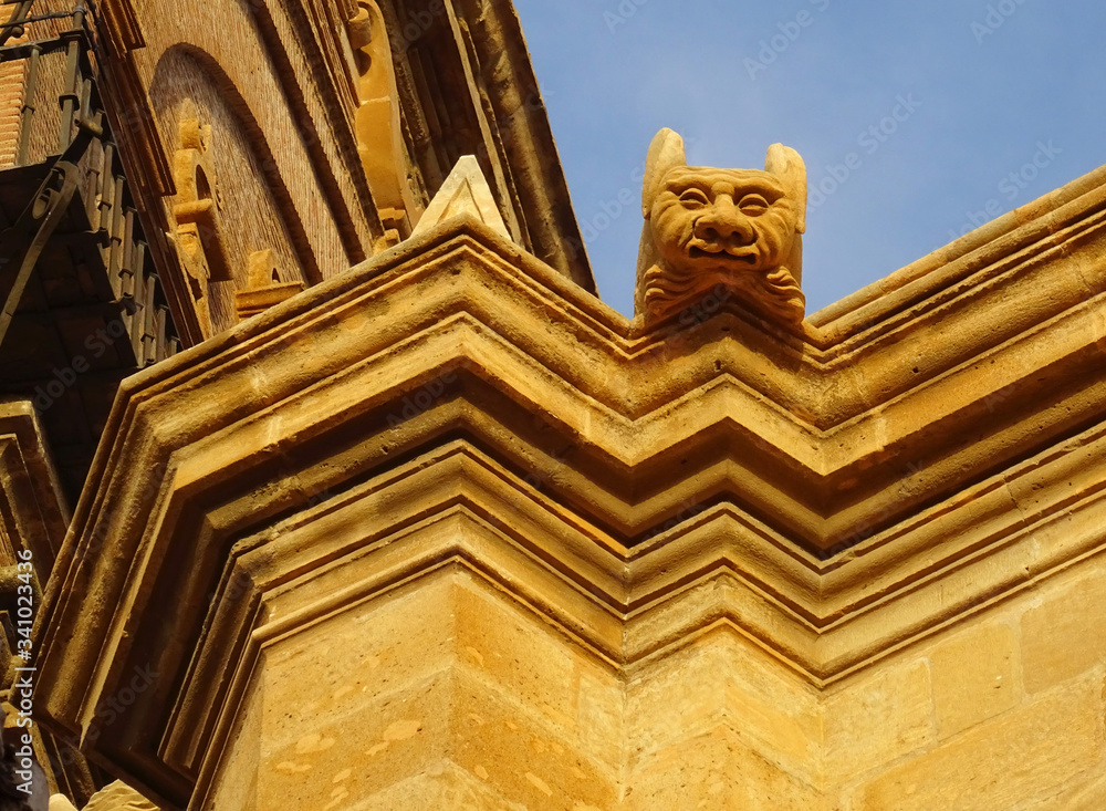 Detail of gargoyles and cornices during de sunset of the Renaissance Cathedral of Guadix. Spain.