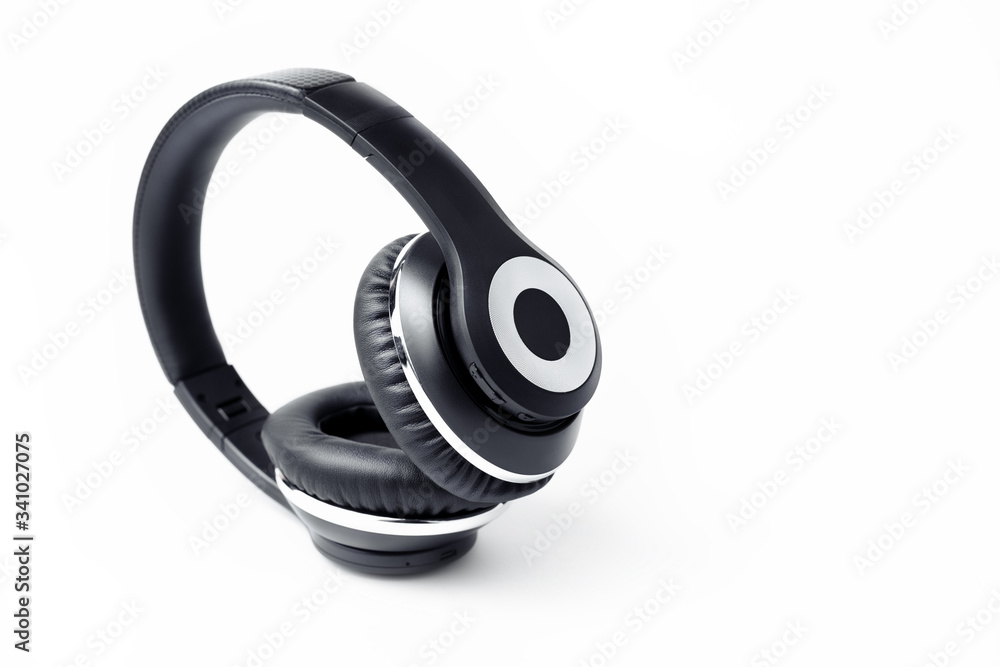 Black stylish professional wireless headphone on white background. High-quality music studio headset. Black stylish professional wireless headphone on white background. High-quality music studio headset.