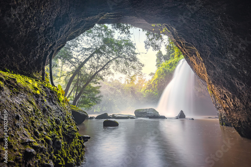 Waterfall in tropical forest at Khao Yai National Park  Thailand. Waterfall view from inside the cave.