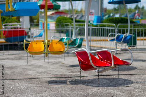 carousel in the Park empty seats © yakowiric1959