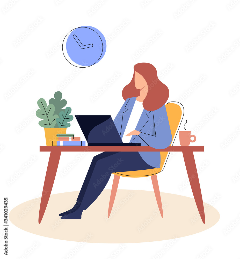 Businesswoman is sitting at a table with a laptopr.