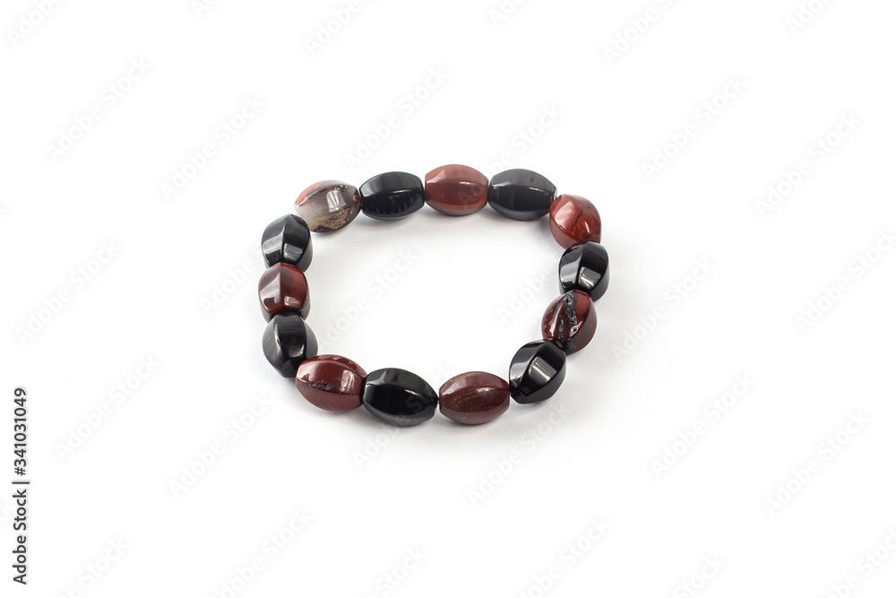 Tiger eye bracelet on a white background isolate Tiger eye bracelet on a white background isolate