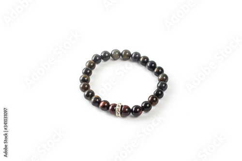 Tiger eye bracelet on a white background isolate